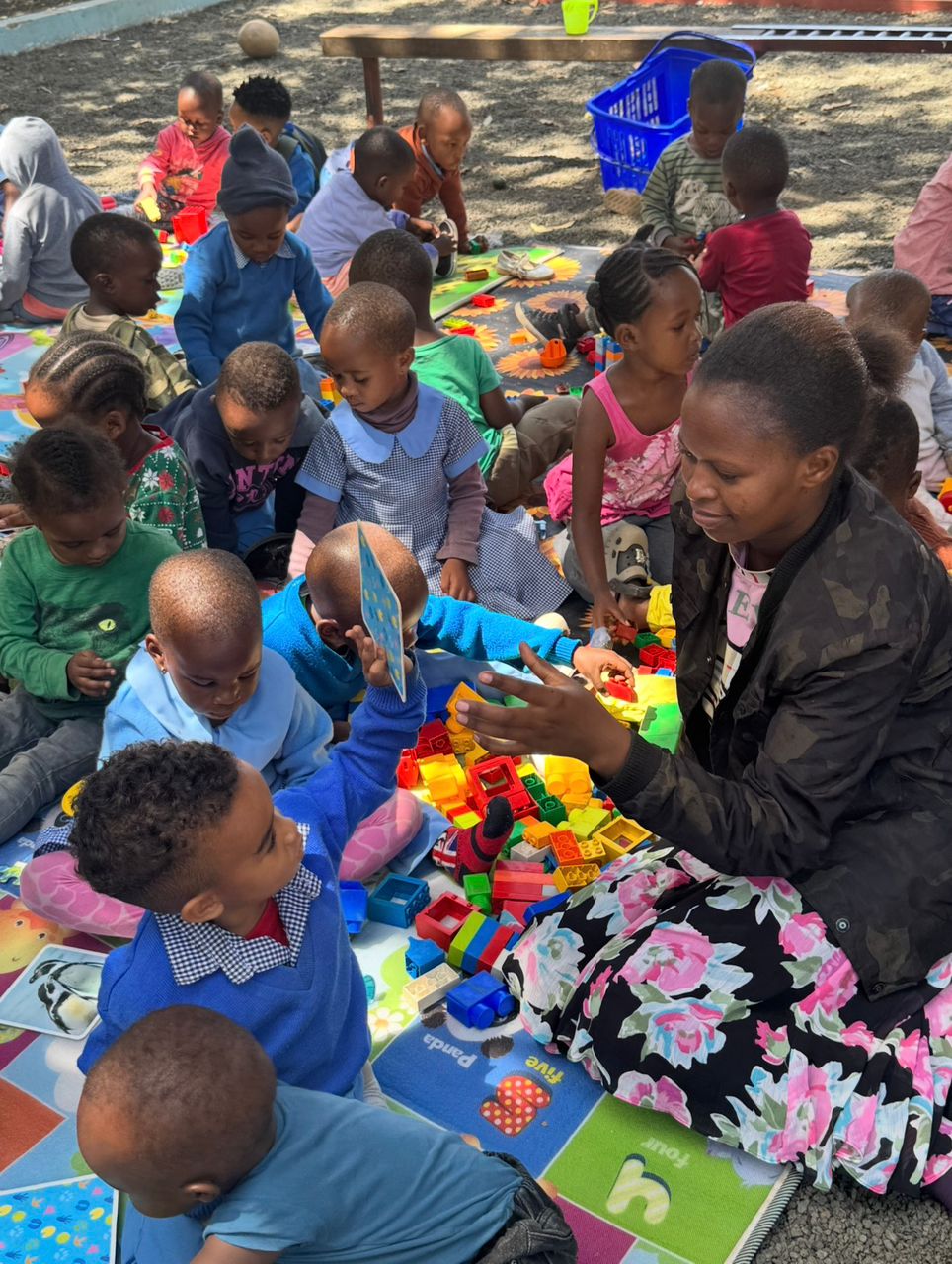 Teacher with building blocks